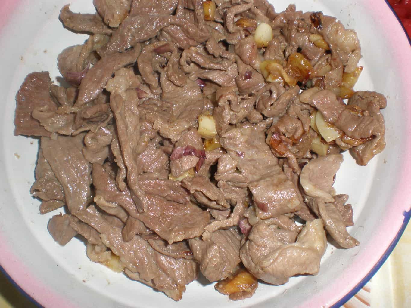 Carne de caballo macerada en ajo