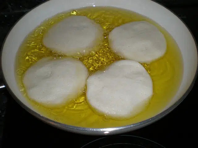 Freír arepas Freír arepas