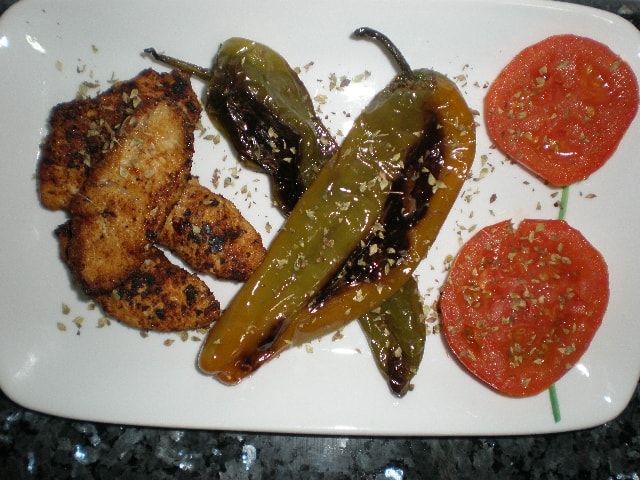 Lomos de pavo con pimientos y tomates