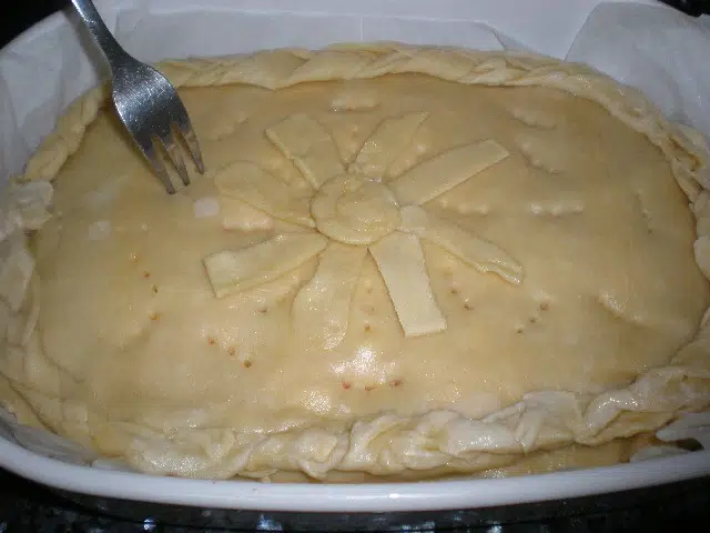 Pinchar empanada boloñesa